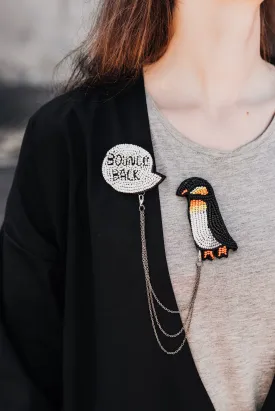 Chain pin with cartoon inspired penguin "I am Resilient" II