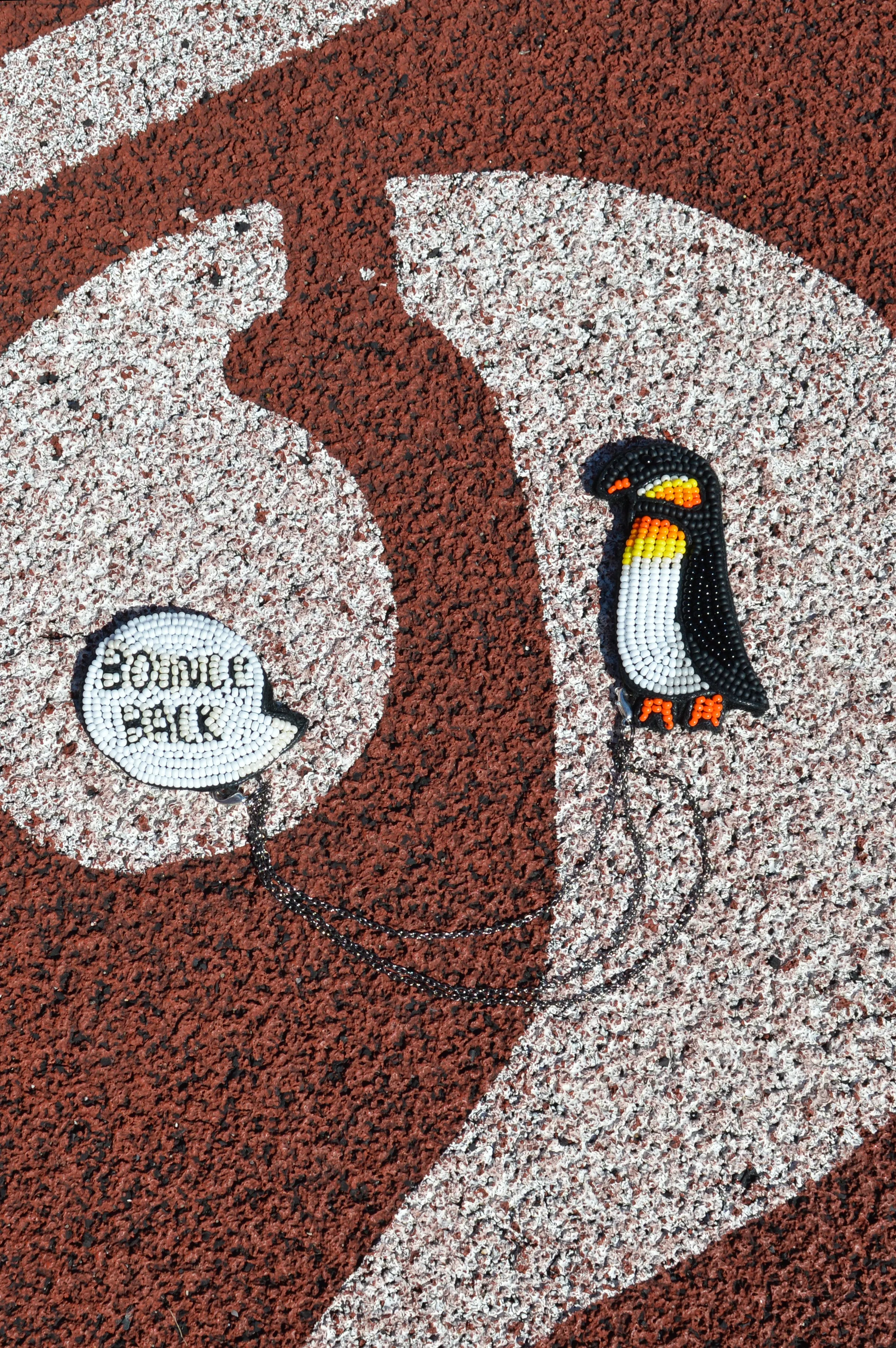 Chain pin with cartoon inspired penguin "I am Resilient" II